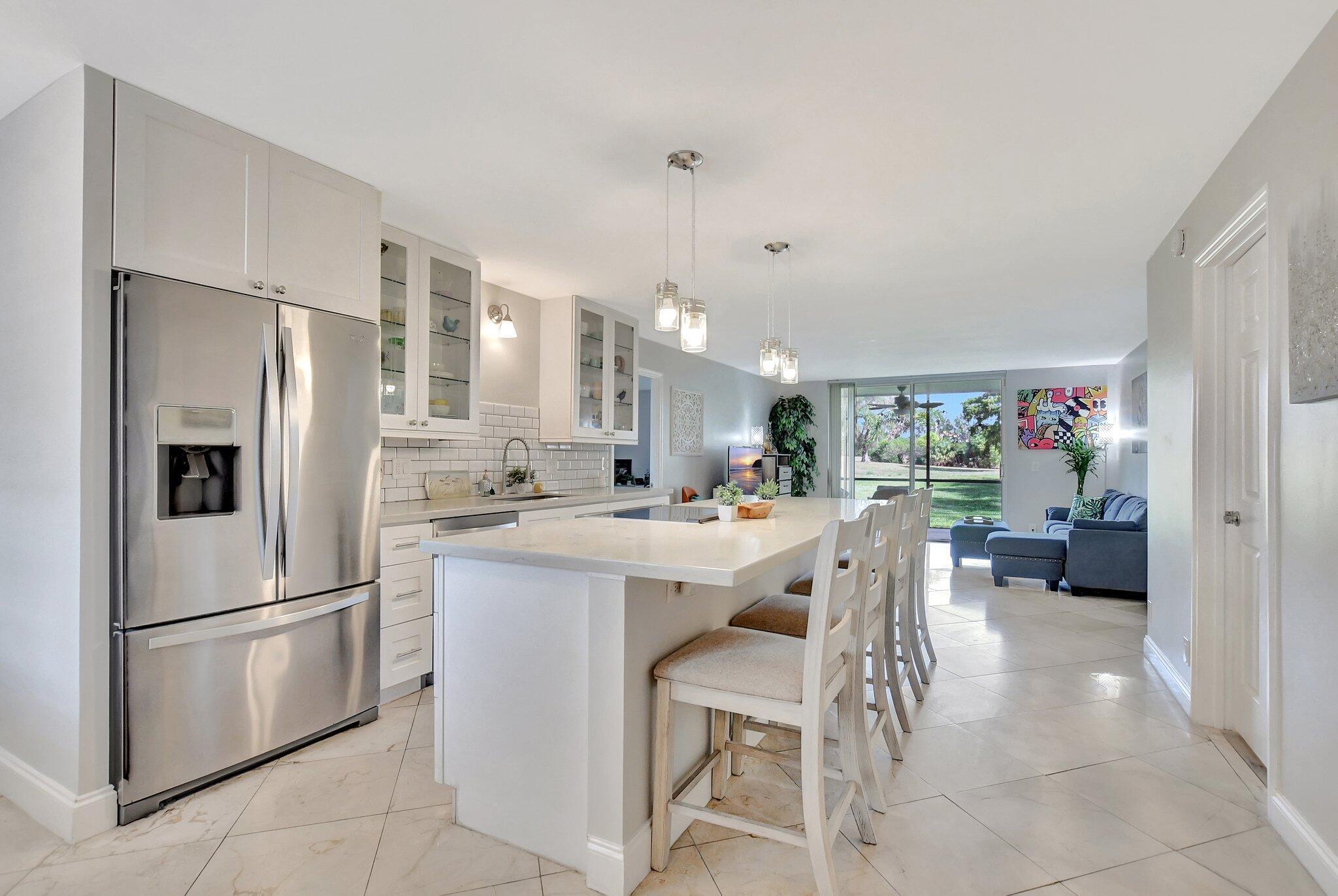 Welcome to this beautifully updated end-unit condo, ideally located about 10 minutes from the beach! Featuring a spacious, modern kitchen, this 3-bedroom, 2-bathroom home is perfect for relaxed coastal living. Situated on the first floor, it offers easy access with a tranquil backyard patio and plenty of privacy--perfect for outdoor enjoyment. The home is surrounded by A rated schools in Palm beach county and minutes from 95. Don't miss the chance to call this serene retreat your own!