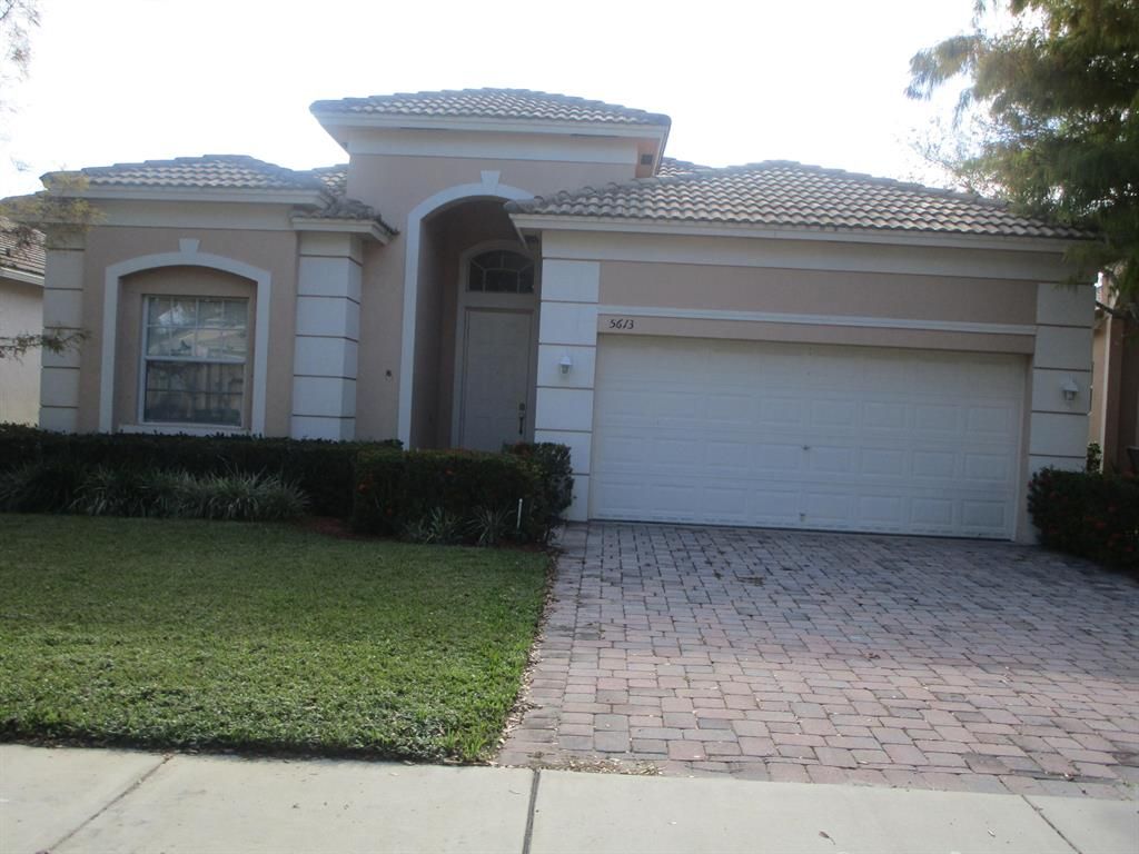 Photo of 5613 Sun Pointe Drive, Fort Pierce, FL 34951 (MLS # R10753231)