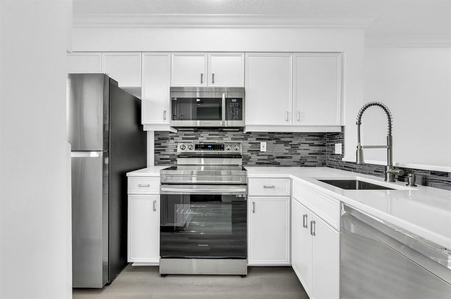 Experience the ultimate resort-style living. This stunning condo offers everything you need to indulge in a life of comfort and relaxation.
Inside, you'll find a home that's been thoughtfully upgraded to meet all your needs. A brand new AC system ensures your comfort in any weather, and new grey vinyl luxury floors throughout the condo provide a modern touch that's both stylish and 100% waterproof.
The kitchen has brand new countertops and top-of-the-line appliances. Cooking becomes a pleasure in this beautifully designed space. Plus, a new washer and dryer add convenience to your daily routine.
Every corner of this condo has been given a fresh coat of paint, giving it a clean and vibrant feel. New light fixtures illuminate the rooms, creating a warm and inviting atmosphere.
The bathrooms have been updated with new vanities.
Finally, you step onto your screened-in patio and immerse yourself in the tranquility of the gorgeous lake view. This serene outdoor space is perfect for unwinding after a long day.
Here, pets are welcome, so your furry friends can enjoy the resort-like lifestyle too. And speaking of resort living, you'll have access to fantastic amenities, including a pool, an in-ground Jacuzzi, a scenic walk/jog path, tennis courts, a clubhouse, and a billiard room. It's like having a vacation retreat right at your doorstep.

Conveniently located less than 20 minutes from Fort Lauderdale/Hollywood International Airport, traveling is a breeze whether you're heading out on vacation or welcoming guests.
Don't miss this incredible opportunity to live in style and luxury at a fraction of the cost. Embrace the serenity of the lake, indulge in resort amenities, and create unforgettable memories in your new home. Make this dream lifestyle yours today!