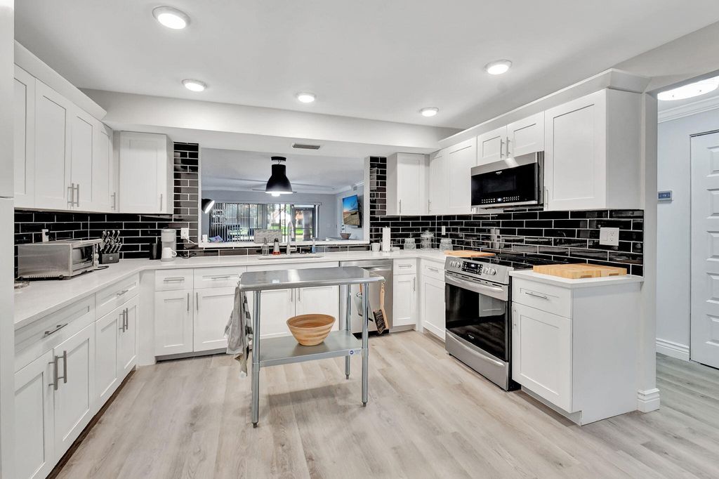 Photo of 9640 Pavarotti Terrace #102, Boynton Beach, FL 33437 (MLS # R11128741)