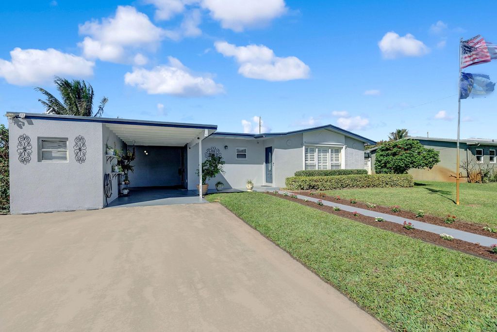 Photo of 309 Henthorne Drive, Palm Springs, FL 33461 (MLS # R10962849)