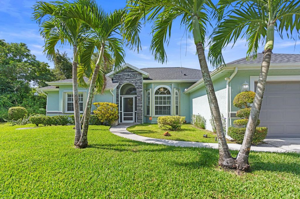 Photo of 1674 SW Escobar Lane, Port Saint Lucie, FL 34953 (MLS # R11110084)