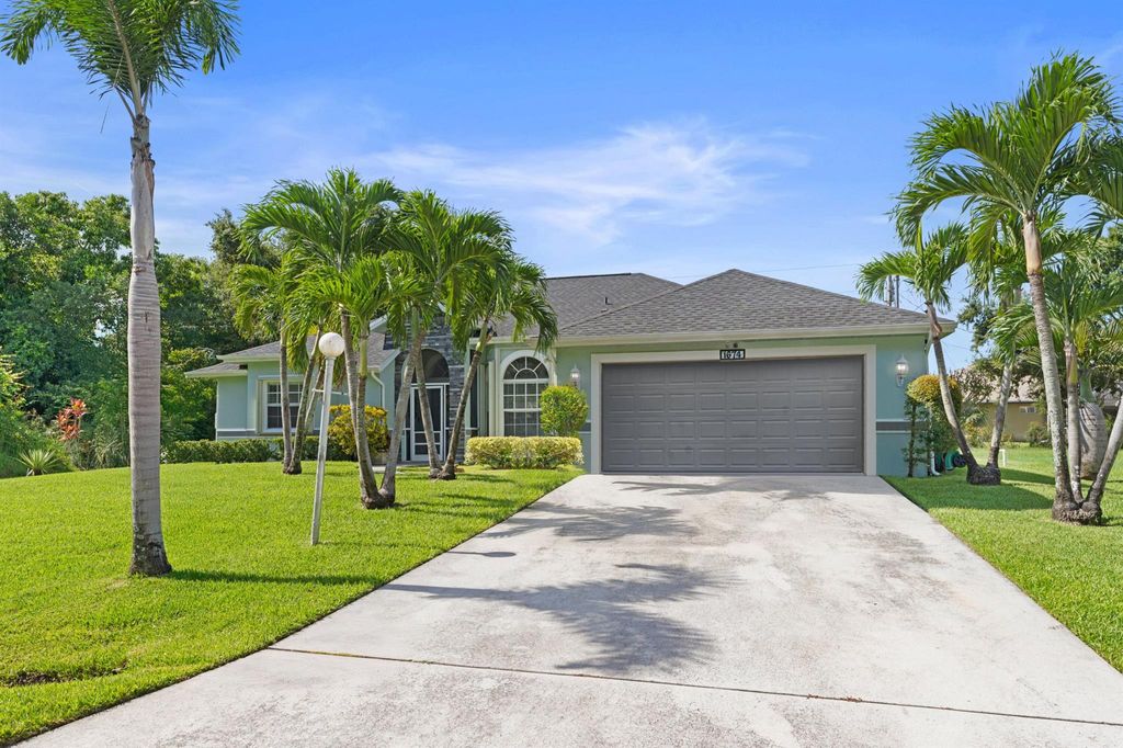 Photo of 1674 SW Escobar Lane, Port Saint Lucie, FL 34953 (MLS # R11110084)