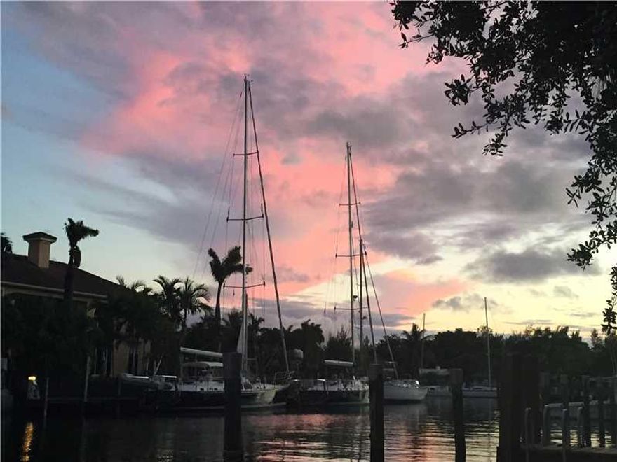 HERE IS YOUR CHANCE TO OWN IN RIO VISTA ON THE WATER FOR UNDER $500K -- BEAUTIFULLY UPDATED TOWNHOUSE WITH DEEDED DOCK TO ACCOMMODATE A BOAT UP TO 35 FEET. REMODELED WITH CUSTOM KITCHEN, GRANITE COUNTERTOPS, FIREPLACE IN LIVING ROOM, BUILT IN CLOSETS IN E ACH BEDROOM. SMALL COMPLEX WITH ONLY SIX UNITS SURROUNDED BY LUSH LANDSCAPING. EXCELLENT, WATERFRONT LOCATION, JUST MINUTES TO PORT EVERGLADES, ATLANTIC OCEAN AND THE LAUDERDALE YACHT CLUB. A BOATERS DREAM, RENT RIGHT AWAY, SMALL PETS WELCOME.