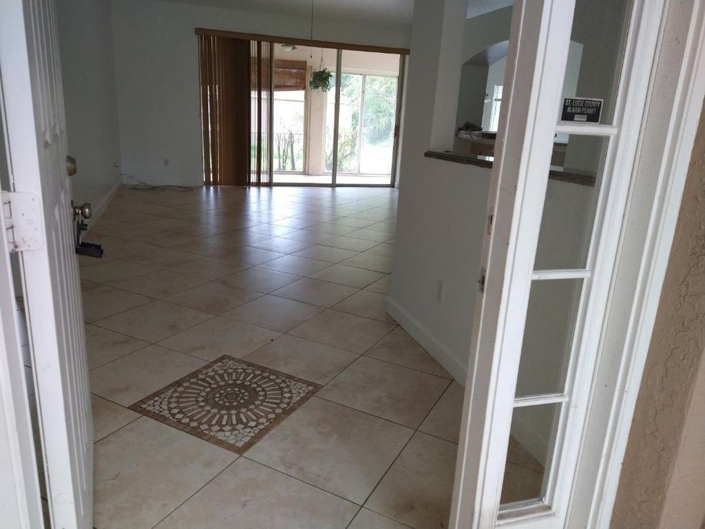 Photo of 573 NW Azine Avenue, Port Saint Lucie, FL 34983 (MLS # R11098381)