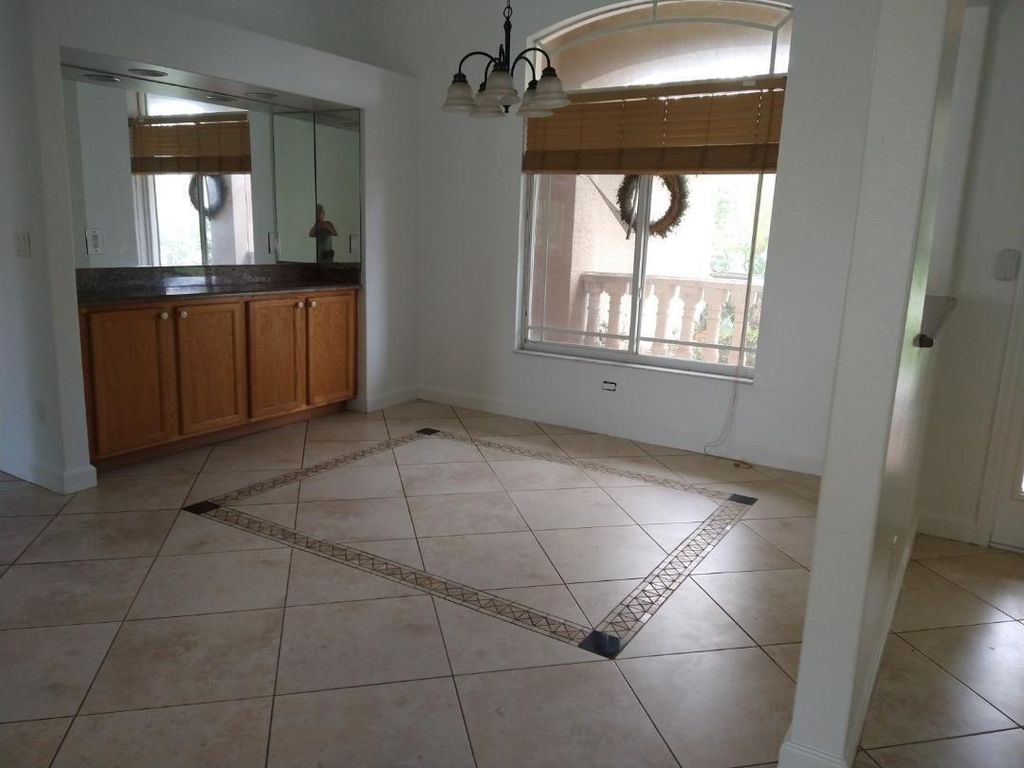 Photo of 573 NW Azine Avenue, Port Saint Lucie, FL 34983 (MLS # R11098381)