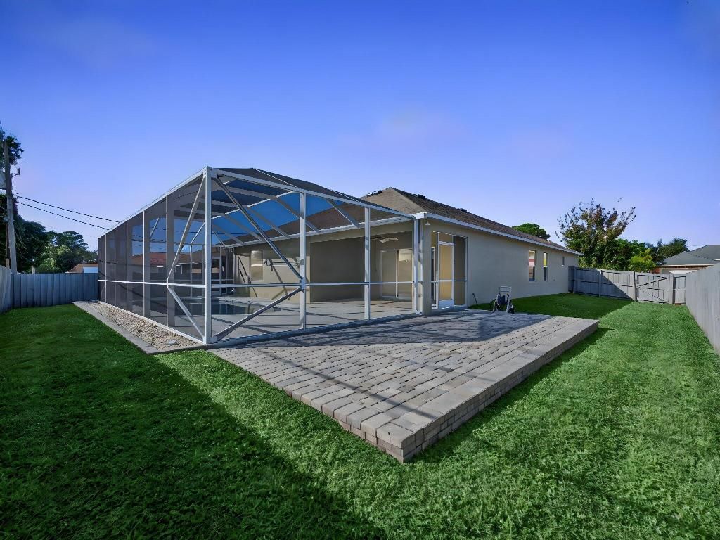 Photo of 1756 SW Cannon Avenue, Port Saint Lucie, FL 34953 (MLS # R11144430)