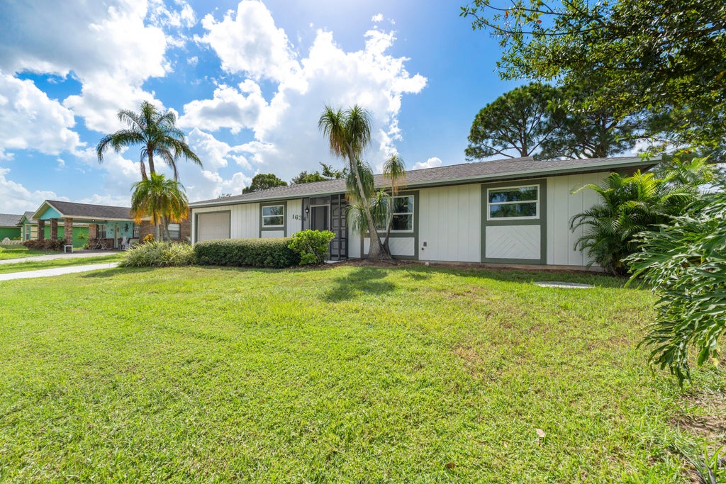 Photo of 1634 SE CLEARMONT Street, Port Saint Lucie, FL 34983 (MLS # B26068532)