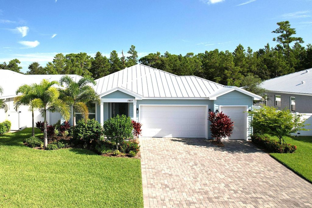 Photo of 1907 SW Pinewood Way, Palm City, FL 34990 (MLS # R10917919)