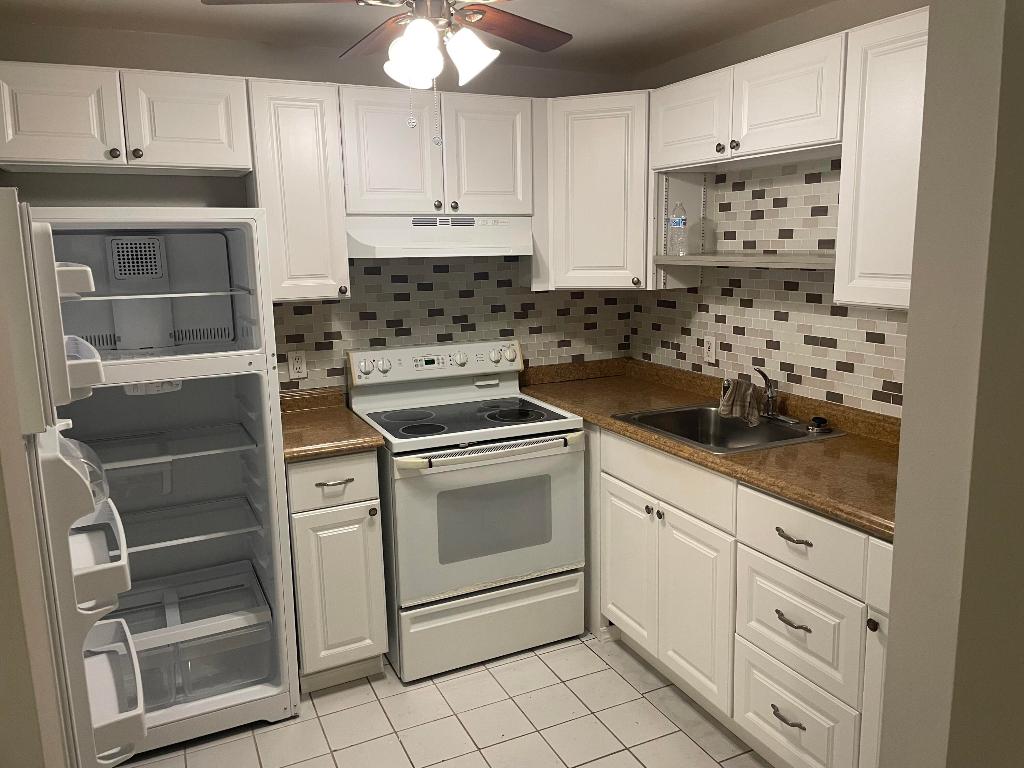 VILLAGE GREEN WINDSOR CONDO - Residential