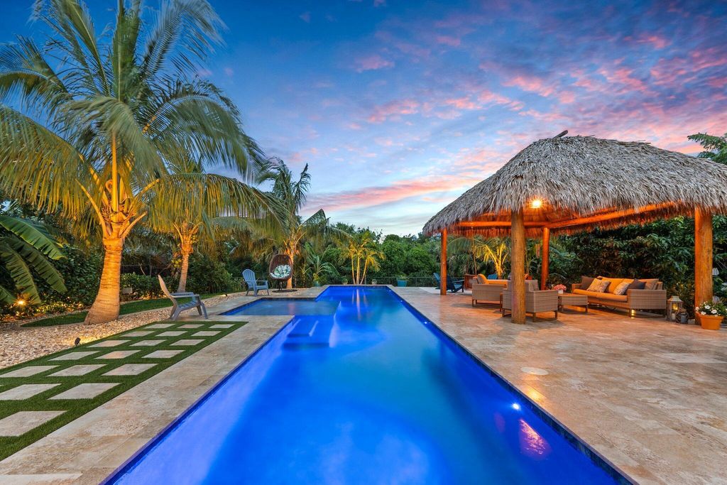 Photo of 1331 NE Langford Lane, Jensen Beach, FL 34957 (MLS # R11087798)