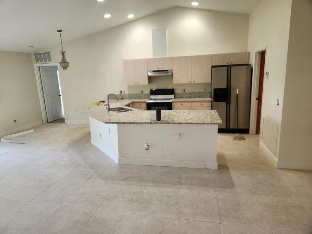 Photo of 1470 SW Sudder Avenue, Port Saint Lucie, FL 34953 (MLS # F10541090)