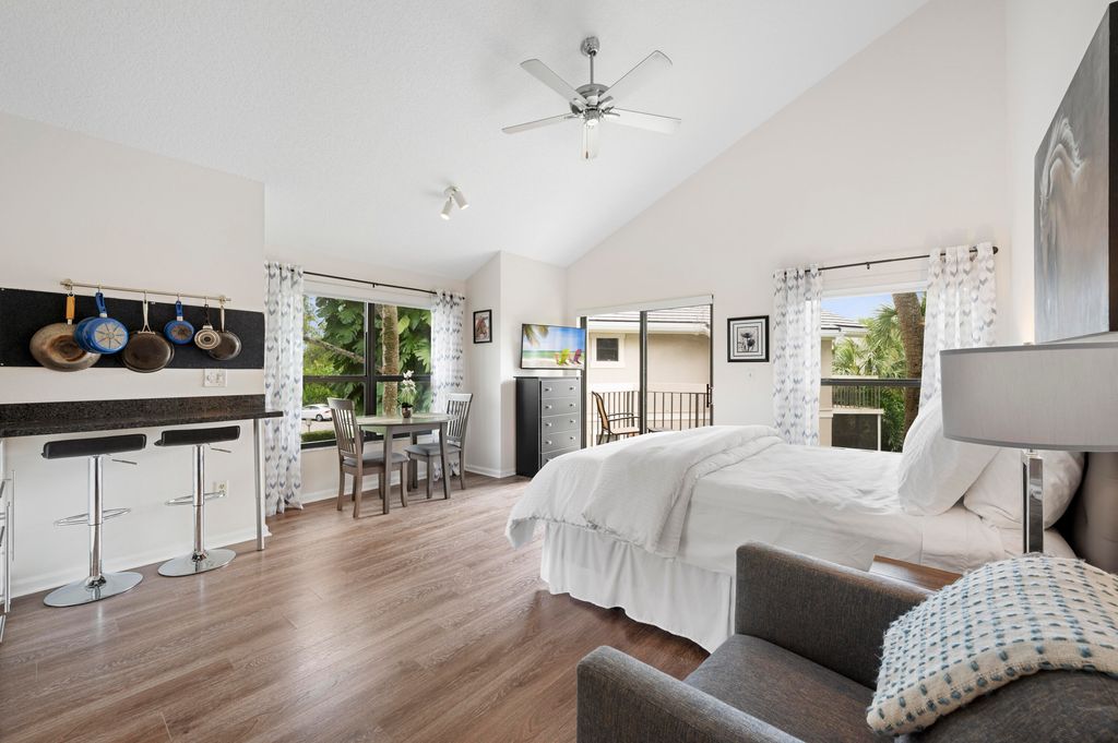 Photo of 11863 Wimbledon Circle #543, Wellington, FL 33414 (MLS # B26027643)