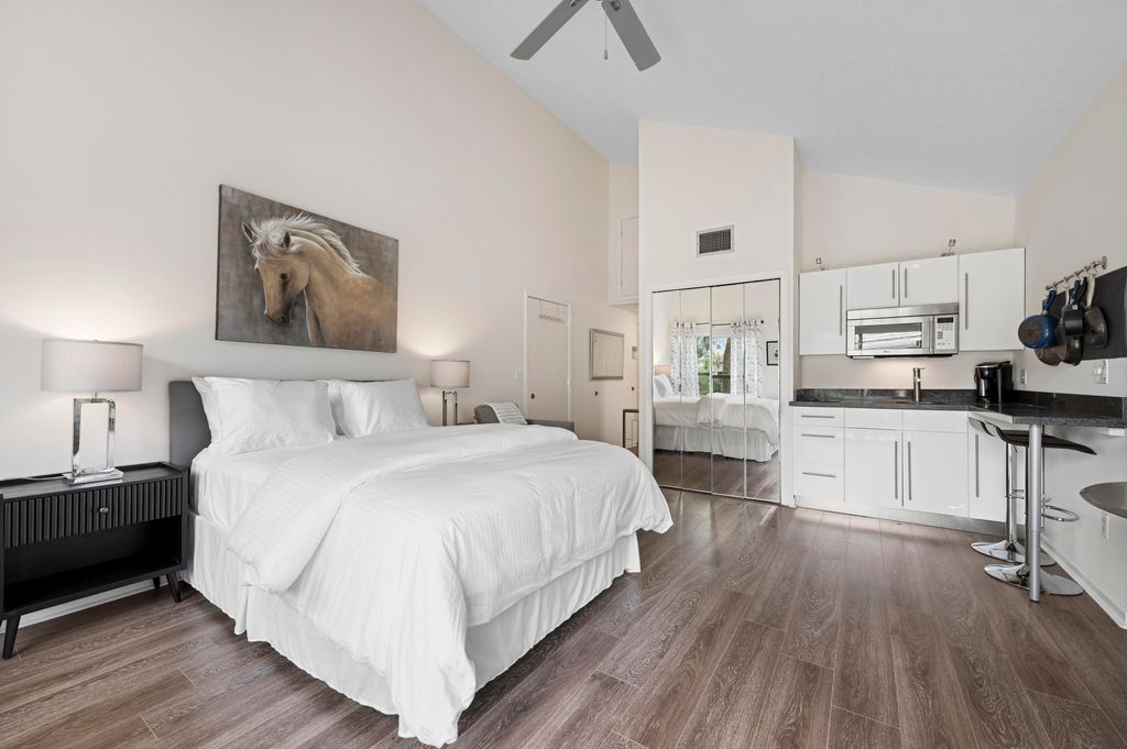 Photo of 11863 Wimbledon Circle #543, Wellington, FL 33414 (MLS # B26027643)