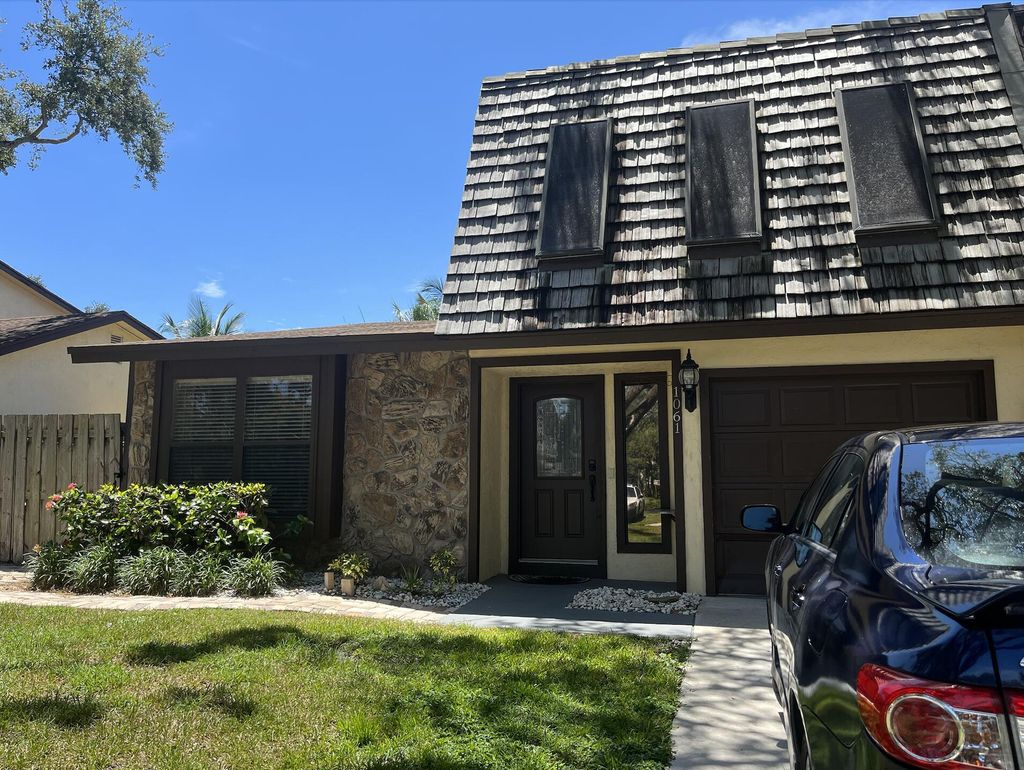 Photo of 1061 Raintree Lane, Palm Beach Gardens, FL 33410 (MLS # R10964606)