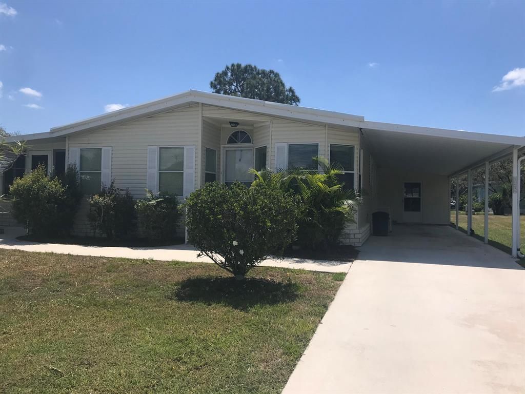 Photo of 2472 SW Marquis Terrace, Stuart, FL 34997 (MLS # R10717864)