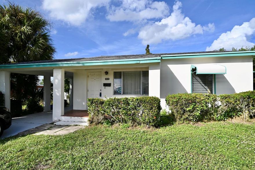 Solid CBS construction single family home. Enclosed patio with insulated ceiling adds to the living space. Detached storage shed with washer hookup.  Attached carport, cedar closets, vintage working stove.  Lots of potential, A/C 2011, hot water heater 2013, new electrical box 2008, new front and back doors 2008, Terrazzo floors.