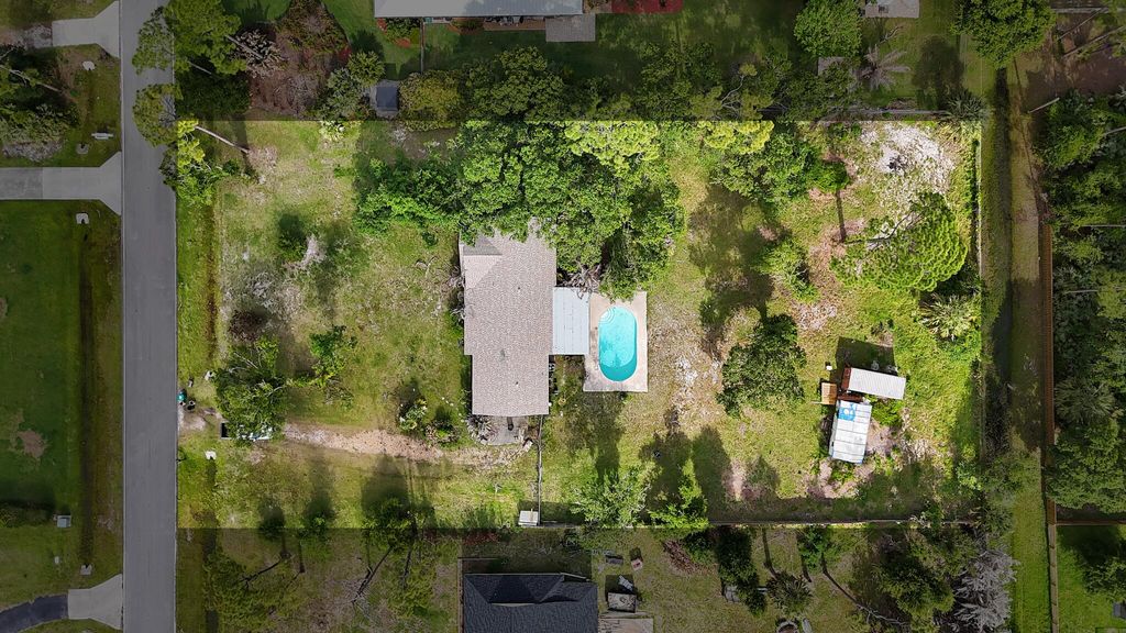 Photo of 8631 Hidden Pines Road, Fort Pierce, FL 34945 (MLS # B26015442)