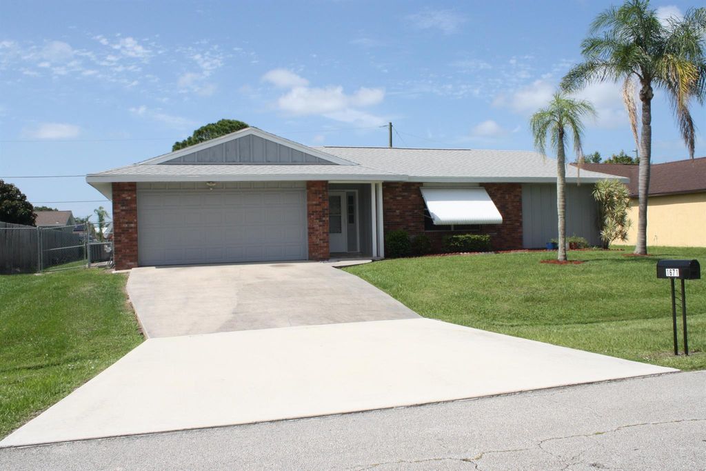 Photo of 1671 SE Minorca Avenue, Port St Lucie, FL 34952 (MLS # R10895059)