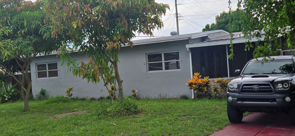 Photo of 1408 W BROOME Street, Lantana, FL 33462 (MLS # B26078362)