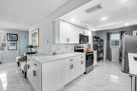 Tiny photo for 114 SW 8th Court, Boynton Beach, FL 33426 (MLS # B26054155)