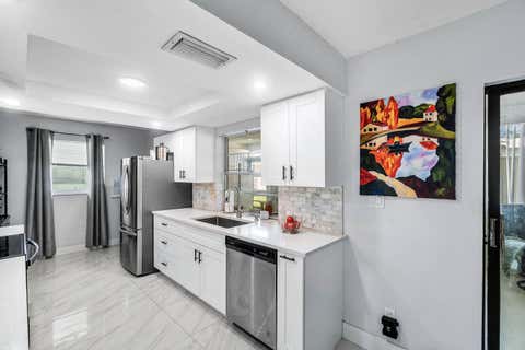 Tiny photo for 114 SW 8th Court, Boynton Beach, FL 33426 (MLS # B26054155)