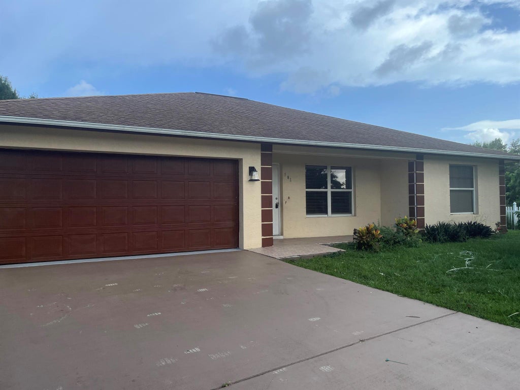 Photo of 702 SW Amber Terrace, Port Saint Lucie, FL 34953 (MLS # R11031587)