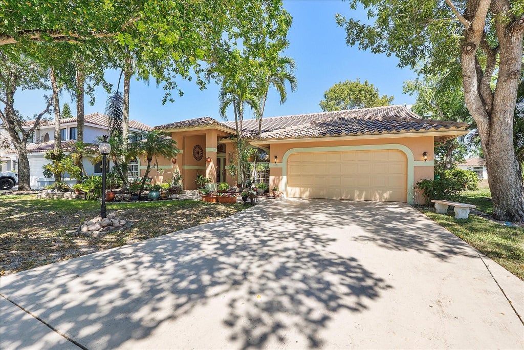 Photo of 4636 ROTHSCHILD Drive, Coral Springs, FL 33067 (MLS # B26075411)