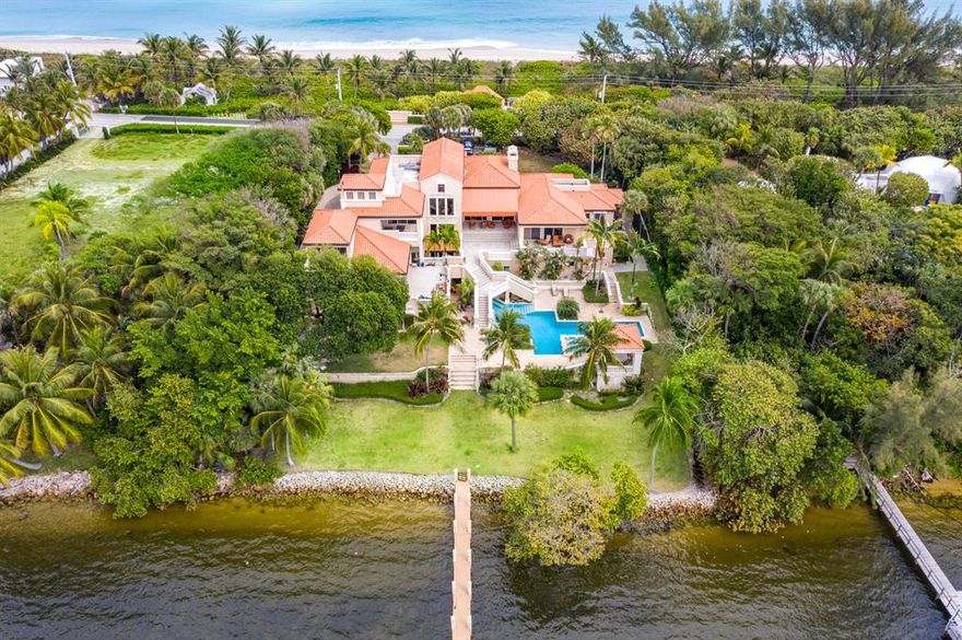 Escape to your private compound and enjoy the best of both worlds. Extraordinary opportunity to renovate or create your own private estate on approximately 2 acre waterfront parcel with  water frontage totaling 300'. (150' on expansive Intracoastal waterway and 150' of oceanfront) Property boasts of a wide private beach, the ability to renovate or build a new 1000 SF cabana plus 250 SF of decking, and existing large dock. A 11,953 living SF  residence with multiple terraces and large pool currently exists on the property.