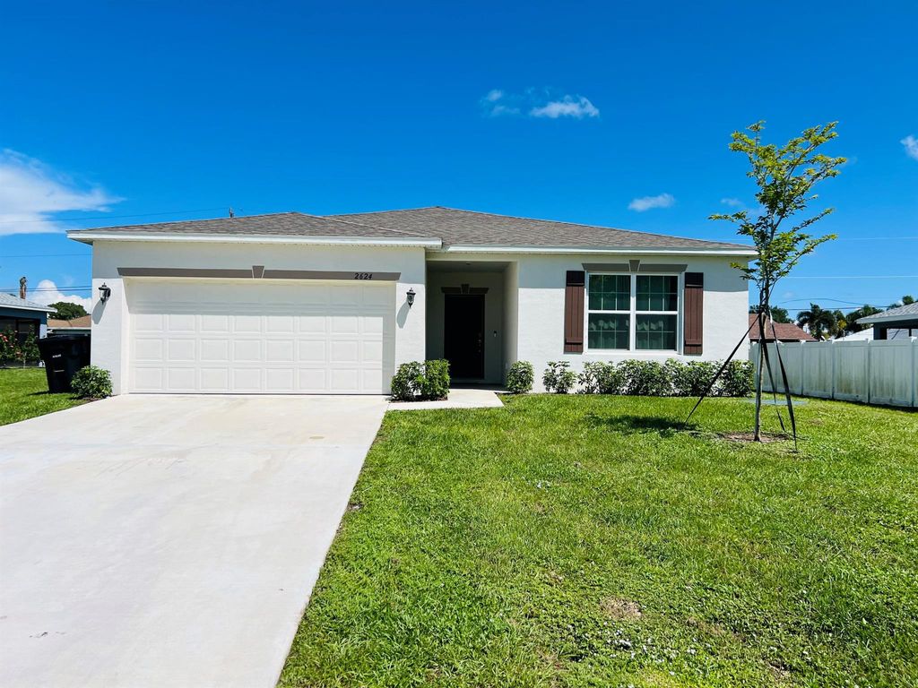 Photo of 2624 SW Ann Arbor Road, Port Saint Lucie, FL 34953 (MLS # R11119705)