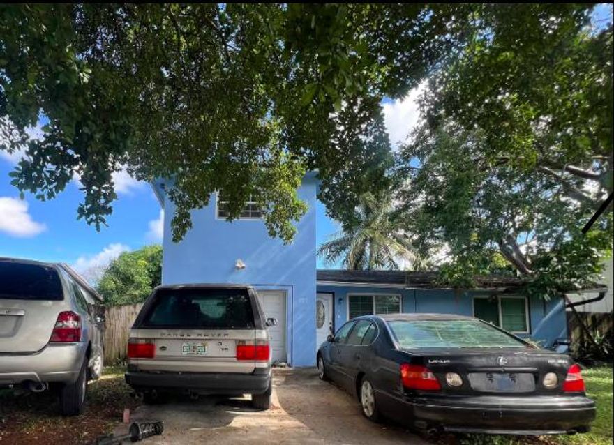 Discover comfort and charm in this beautiful 3-bedroom, 2-bathroom single-family home located in the desirable neighborhood of Hollywood Little Ranches. This inviting residence features a newer roof, impact windows and doors throughout, updated flooring, and renovated bathrooms for modern living. The thoughtfully designed split-bedroom layout offers privacy, while the huge kitchen with a spacious pantry provides plenty of room for cooking and storage. An attached one-car garage adds convenience, and the expansive driveway offers ample parking. Step outside to a large backyard with plenty of space to build your dream pool or create the perfect outdoor oasis. A wonderful place to call home! PICS COMING SOON!