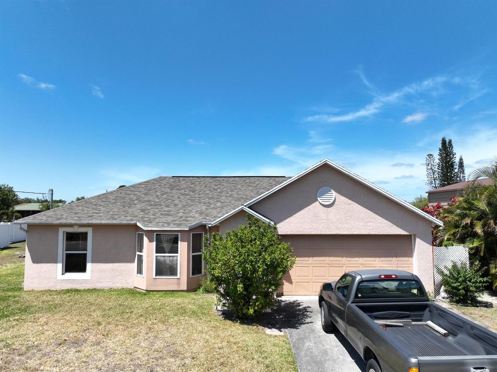 Photo of 1007 SW Idol Avenue, Port Saint Lucie, FL 34953 (MLS # R10940623)