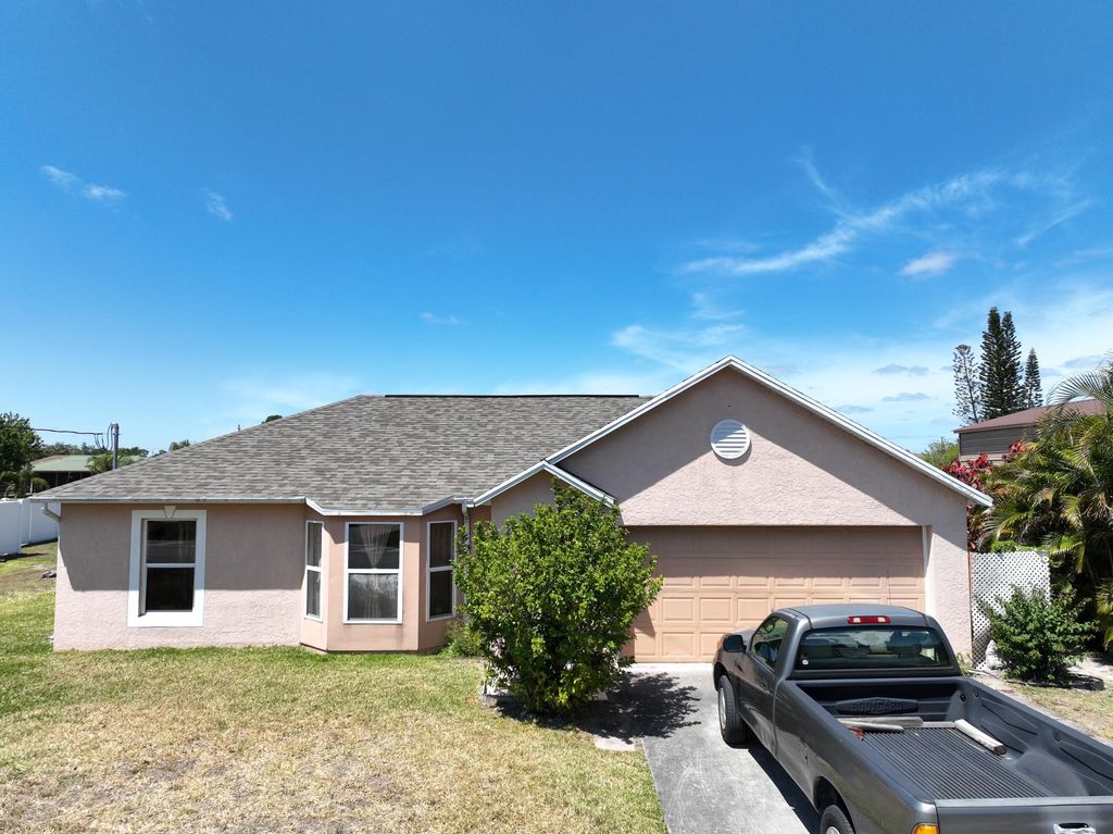 Photo of 1007 SW Idol Avenue, Port Saint Lucie, FL 34953 (MLS # R10940623)