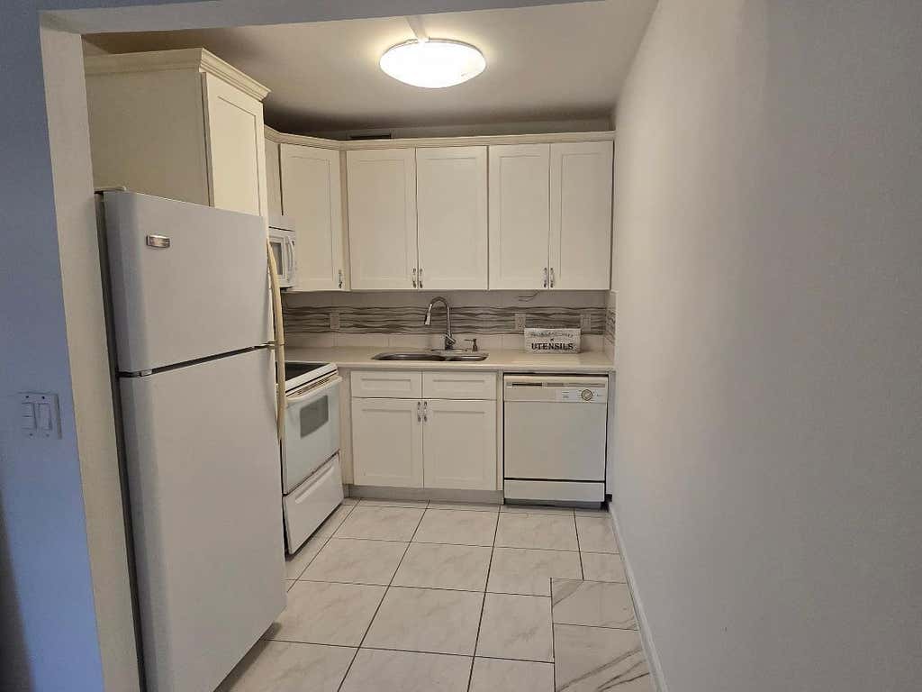 Photo of 227 Kent N, West Palm Beach, FL 33417 (MLS # B26046678)