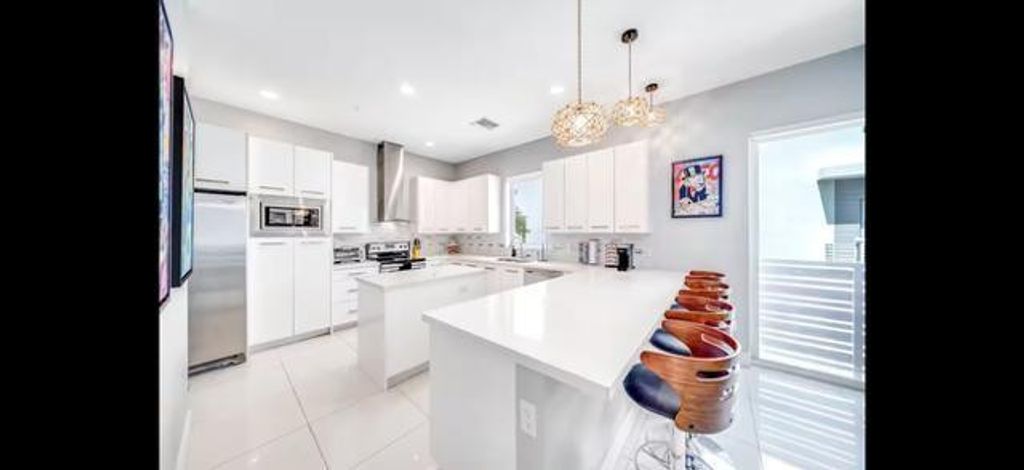 Photo of 1323 Ocean Boulevard #1323, Pompano Beach, FL 33062 (MLS # F10549268)