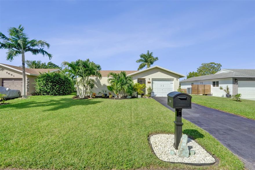 Beautiful waterfront home located in the desirable Westwood community. This charming residence features tile floors throughout, updated impact sliding doors and windows, updated bathrooms, and a spacious kitchen with quartz countertops and stainless steel appliances. Additional highlights include a newer AC unit (2020) and a 1-car garage, and plenty of parking space. Situated in a welcoming 55+ community, this home offers low-maintenance living and a convenient location close to shopping, highways, and schools.