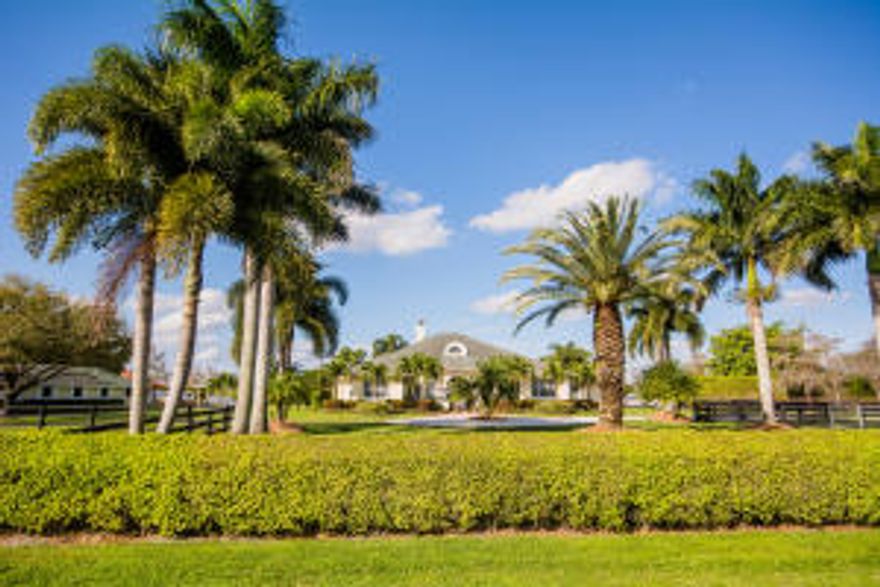 Location, Location, Location! This 10 stall equestrian retreat is only a 5 minute hack to the show grounds from the desirable Saddle Trail community. The barn is complete with T&G ceiling, watering system for each stall, fly spray, tack room, laundry, efficiency apartment, large riding arena, spacious paddocks, separate entrance and ample trailer parking. There area also 4 large paddocks.The 4 bedroom/ 3 bath home is in move-in condition. There is a large lanai and private pool deck area complimented by the heated spa/pool ready for entertaining. Mature landscaping throughout the property adds to the charm of this beautiful equestrian retreat with an unbelievable location.