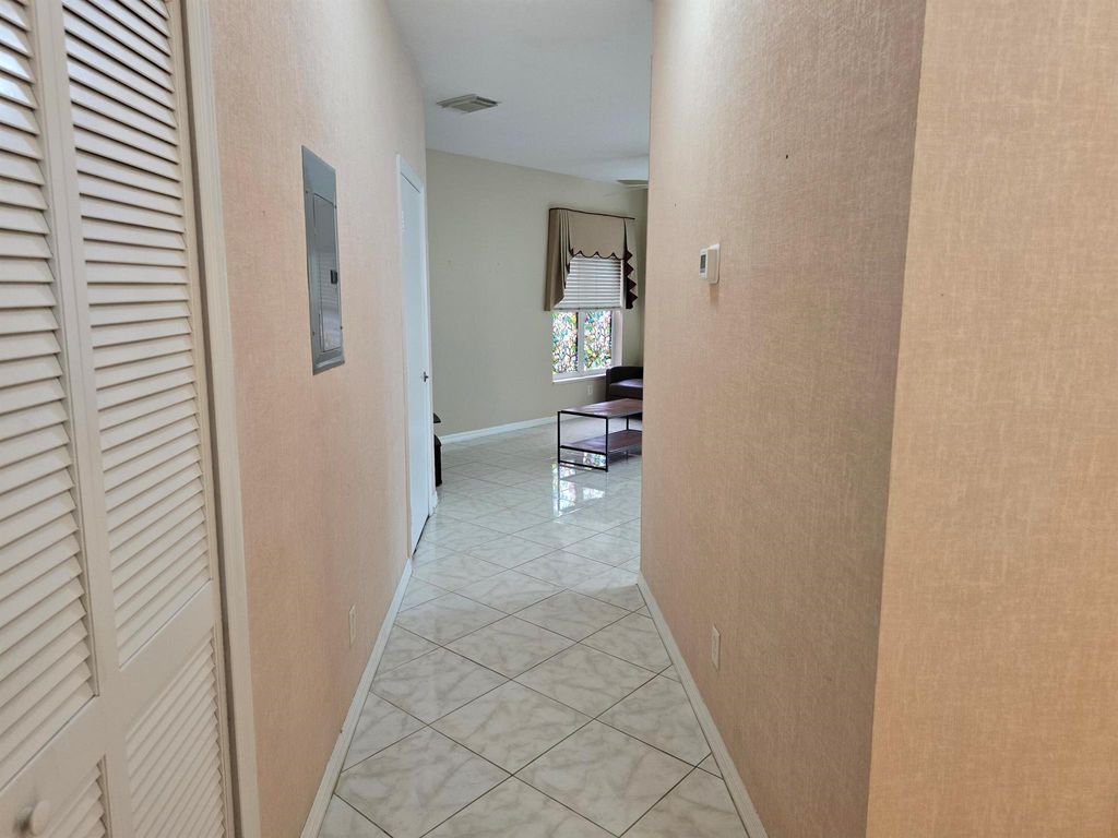Photo of 10021 Perfect Drive #A, Port Saint Lucie, FL 34986 (MLS # R11000099)
