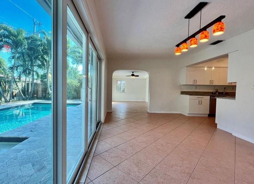 Photo of 4700 NE 3rd Terrace, Oakland Park, FL 33334 (MLS # F10546178)