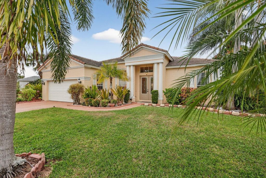 Photo of 544 SW Lake Manatee Way, Port Saint Lucie, FL 34986 (MLS # F10544879)