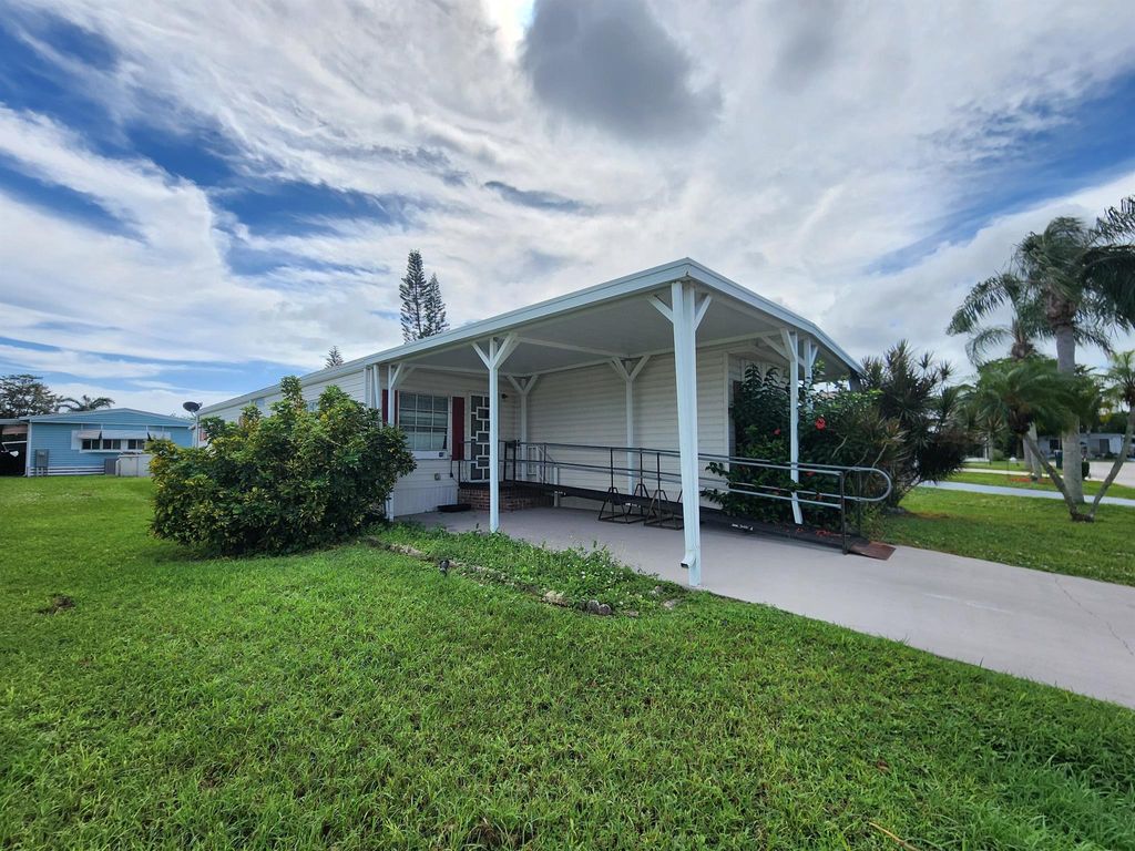 Photo of 8 Del Sol, Port Saint Lucie, FL 34952 (MLS # R11035256)