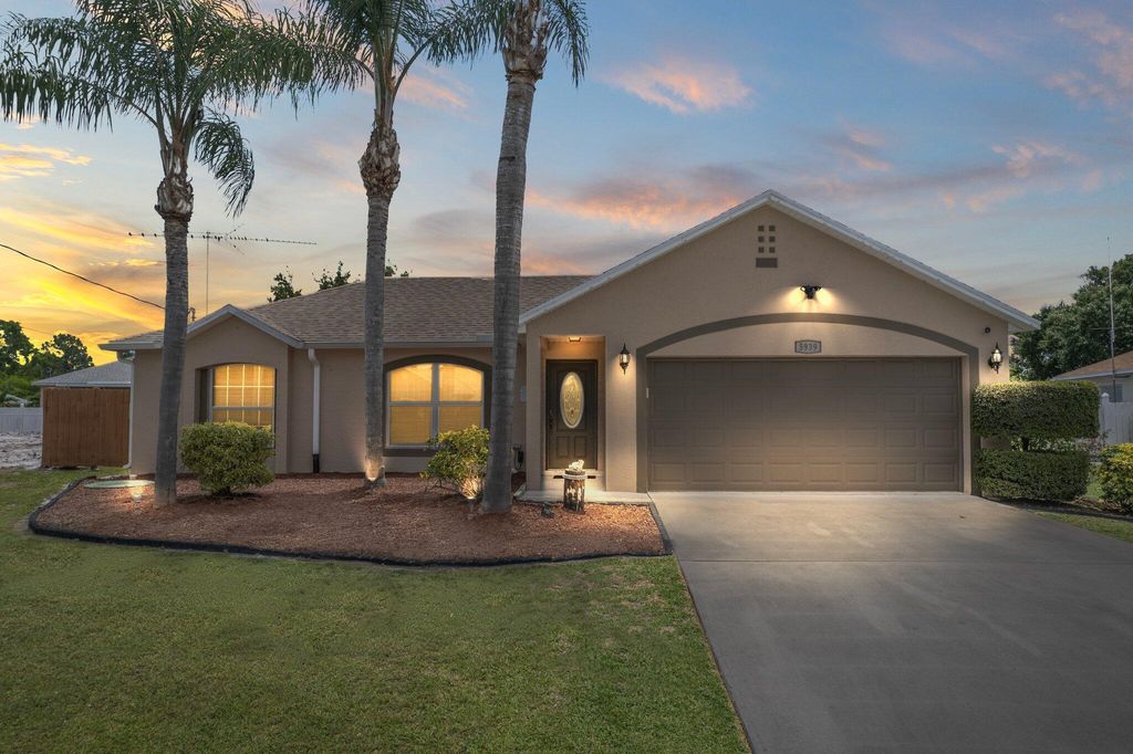 Photo of 5939 NW Center Street, Port Saint Lucie, FL 34986 (MLS # R10997482)