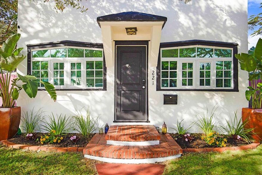 Step back in time and embrace the charm of yesteryear in this beautifully renovated 1930's home boasting an array of historical features. From the elegant coquina fireplace to the classic plaster walls, French doors, and arched entryways, every detail exudes character and sophistication. The addition of impact windows preserves the home's integrity and ensures storm safety. Beyond the main residence lies a convenient mother-in-law suite, offering versatility and privacy for guests or extended family. Outside, discover an expansive backyard enveloped by lush landscaping and a cozy patio, providing a perfect setting for relaxation and entertainment. Plenty of room for a pool. Shed in the backyard for additional storage. Located just blocks from downtown's Lake Ave. and the beach.