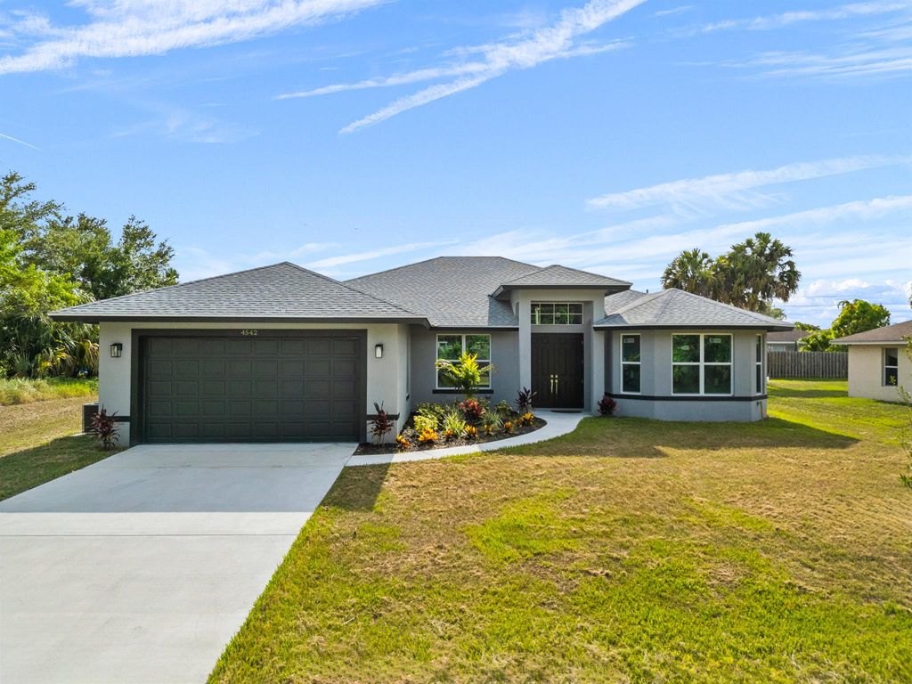 Photo of 4542 SW Wabash Street, Port Saint Lucie, FL 34953 (MLS # R10993561)
