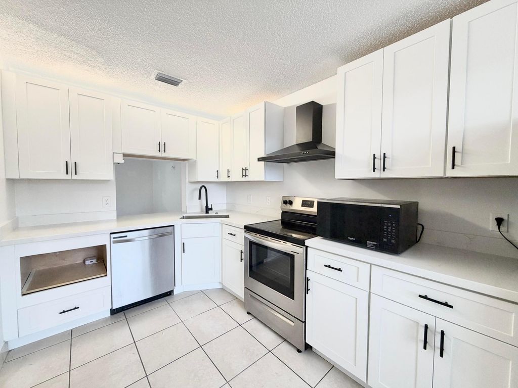 Photo of 799 Hill Drive #D, West Palm Beach, FL 33415 (MLS # R11162230)