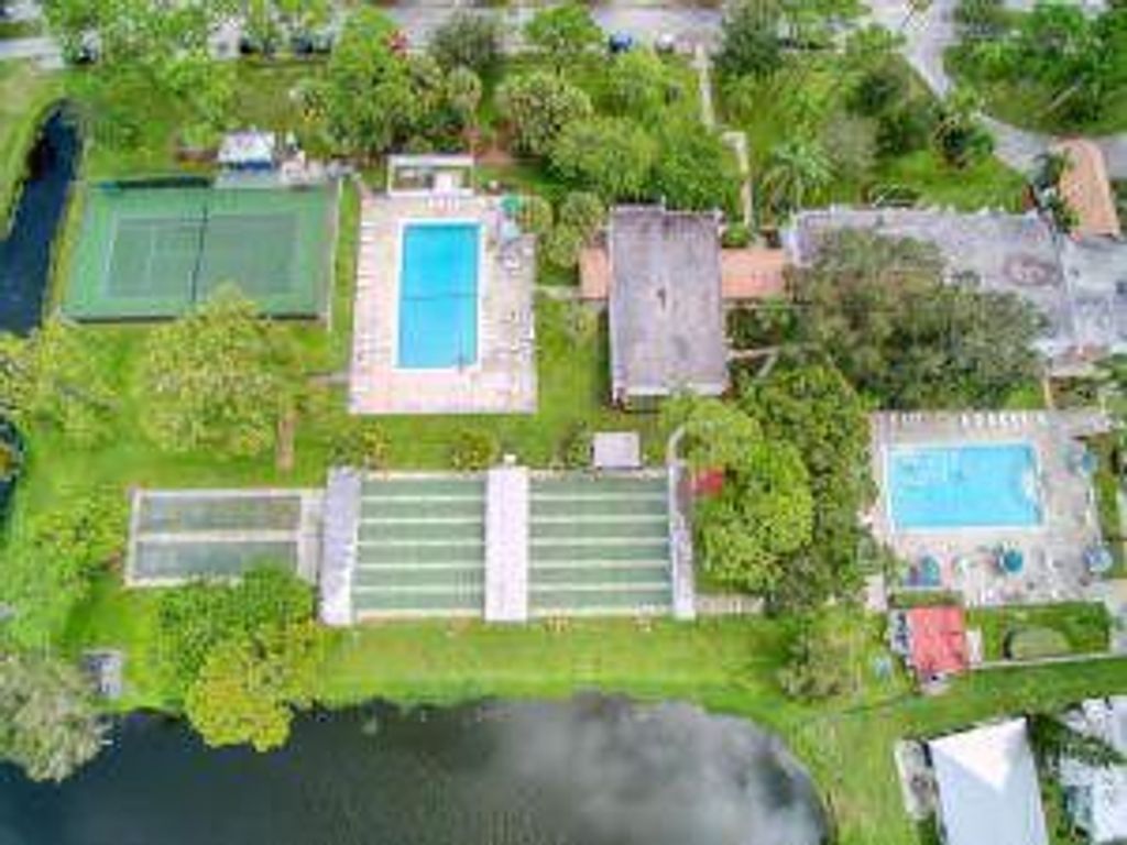 Photo of 8 SE Casa Rio Road, Port Saint Lucie, FL 34952 (MLS # R11068295)