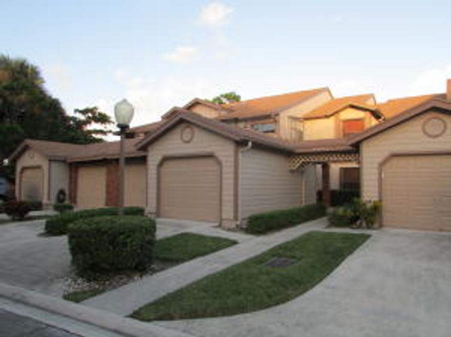 BEAUTIFUL WELL MAINTAINED COMMUNITY OF RIVER BRIDGE WHERE THE GATE IS MANNED 24/7. THIS COMMUNITY FOR ALL AGES FEATURES CLUBHOUSE, 3 POOLS, ONE OF THEM HEATED, 2 HOT TUBS, FITNESS CENTER, 6 TENNIS COURTS. THIS IS POPULAR 2/2 UNIT WITH SPACIOUS BEDROOMS, CATHEDRAL CEILINGS WITH SKYLIGHTS, FIREPLACE AND ATTACHED ONE CAR GARAGE. RELAXING SCREENED AND COVERED BALCONY WITH WATER VIEWS. NEW CARPETS, FRESH PAINT, LAMINATE FLOORS, STAINLESS STEEL APPLIANCES, ACCORDION SHUTTERS.GENERATOR HOOKUP. MINUTES TO WELLINGTON MALL, 15 MINUTES TO CITYPLACE, JUST NEXT TO OKEEHEELLEE PARK, GREENACRES COMMUNITY PARK, WALKING DISTANCE TO PUBLIX. THERE ARE MANY ACTIVITIES IN THE CLUBHOUSE, BINGO, CHILDREN'S ACTIVITIES, PARTIES, ENTERTAINERS ETC. HOA FEES INCLUDE WATER, ROOF MAINTENANCE, INSURANCE...