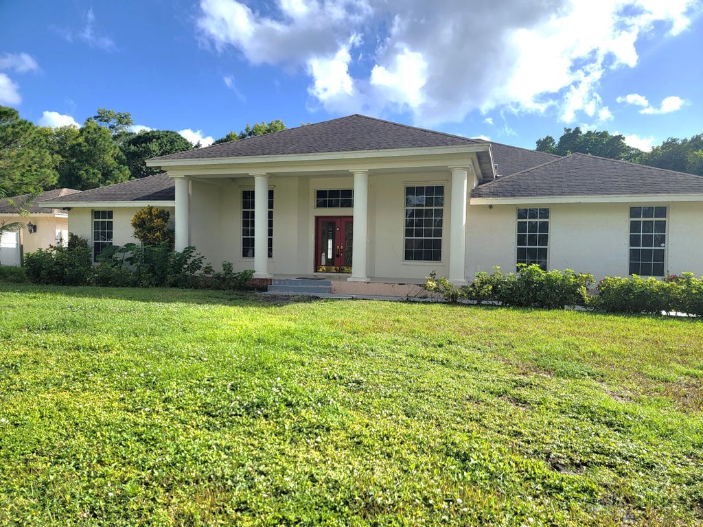 Photo of 13432 N 63rd Lane, West Palm Beach, FL 33412 (MLS # R10933604)