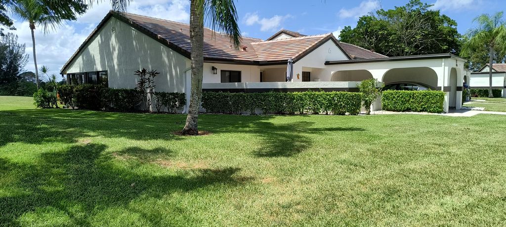 Photo of 5558 Parkwalk Circle E, Boynton Beach, FL 33472 (MLS # B26021123)