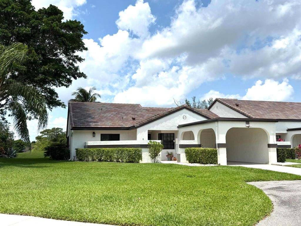 Photo of 5558 Parkwalk Circle E, Boynton Beach, FL 33472 (MLS # B26021123)